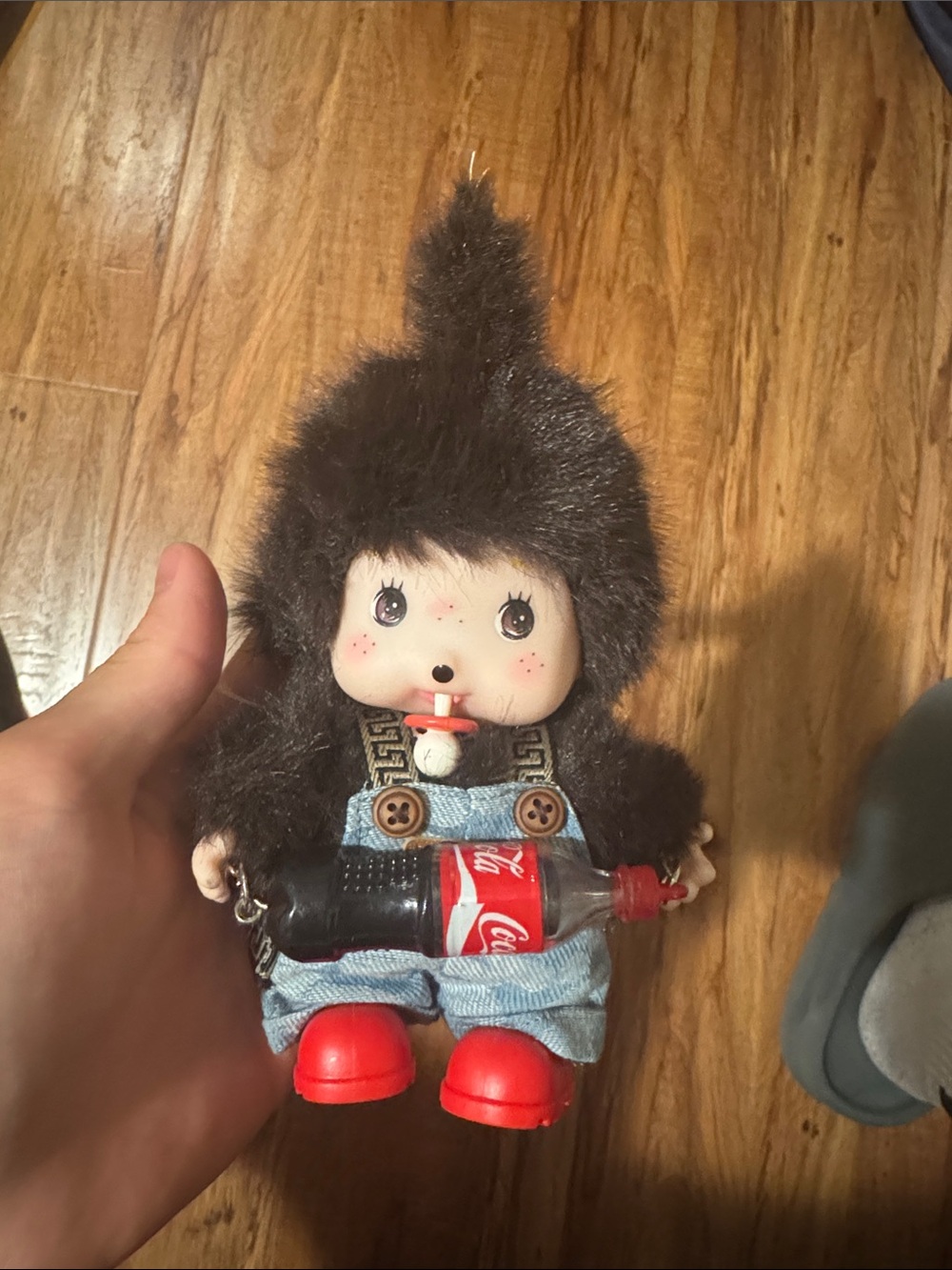 Plushie doll with cola bottle